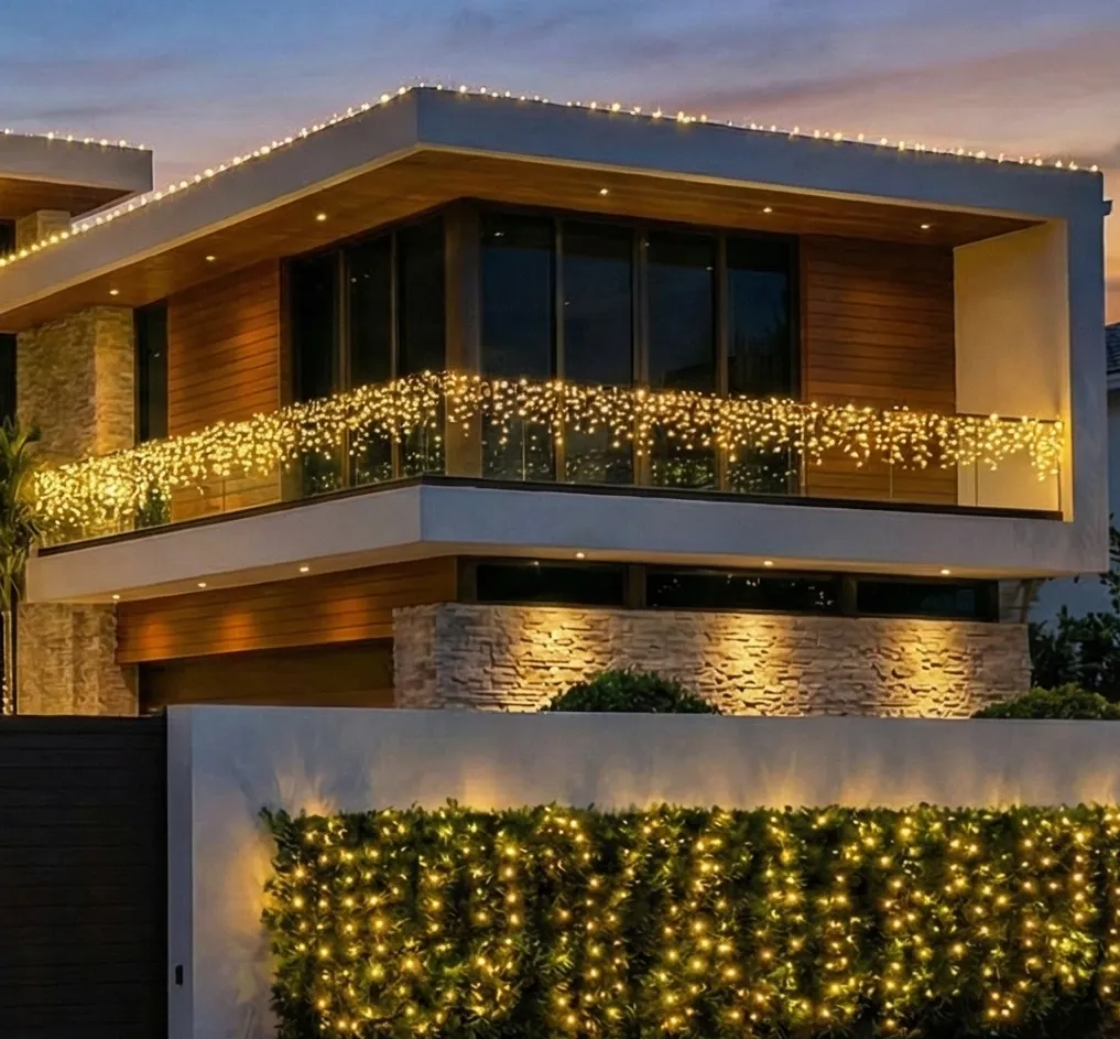 Hollywood luxury home with professional Christmas lighting.